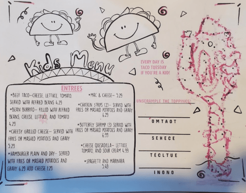 Kids menu featuring fun illustrations, with items like tacos, mac & cheese, and a puzzle to unscramble toppings.